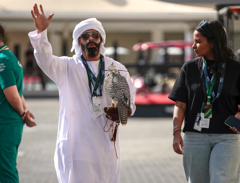 Visitors arrive to see the drivers arrive at Yas Marina Circuit