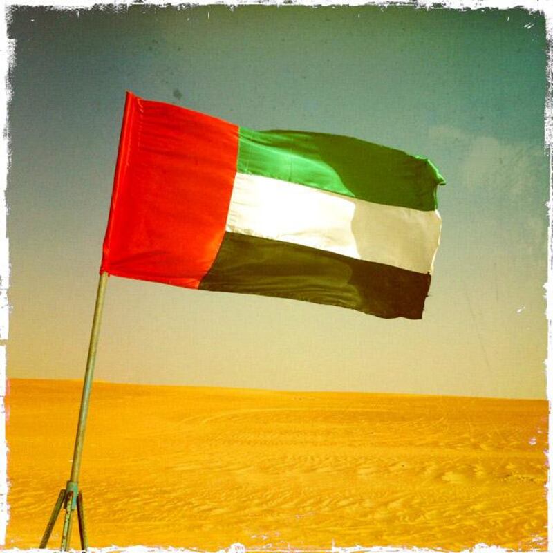 Day trip with friends to the Western Region and the Mazayin Dhafra Camel Festival, 220 kms west of Abu Dhabi on December 20, 2013. The UAE flag was everywhere you looked. Picture taken with the Hipstamatic app for the iPhone. Liz Claus / The National