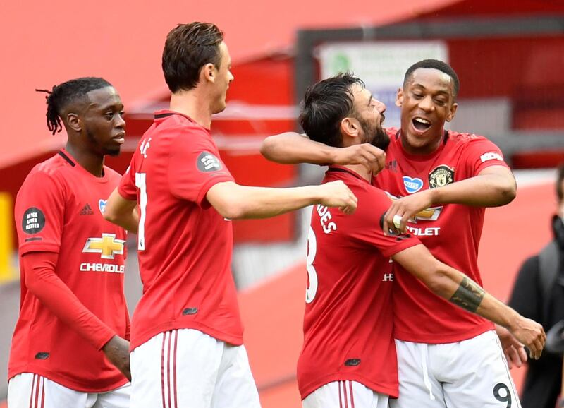 Manchester United's Anthony Martial celebrates scoring their third goal with Nemanja Matic, Bruno Fernandes and Aaron Wan-Bissaka. Reuters