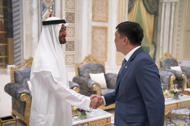 ABU DHABI, UNITED ARAB EMIRATES - May 20, 2018: HH Sheikh Mohamed bin Zayed Al Nahyan Crown Prince of Abu Dhabi Deputy Supreme Commander of the UAE Armed Forces (L), receives HE Samuel Tan Chi Tse Ambassador of Singapore to the UAE (R), during an iftar reception at the Presidential Palace. 

( Hamad Al Kaabi / Crown Prince Court - Abu Dhabi )
---