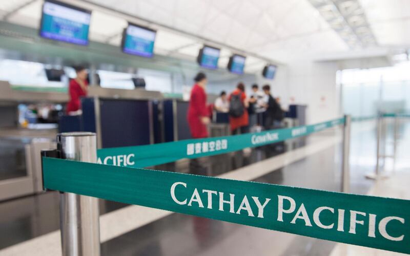 epa07118023 (FILE) - Flight attendants from Hong Kong's flag carrier airline Cathay Pacific are seen at Hong Kong International Airport, Lantau Island, Hong Kong, China, 21 May 2015 (reissued 25 October 2018). According to media reports on 24 October 2018, the personal data of 9.4 million passengers of Cathay Pacific and subsidiary Cathay Dragon was leaked in early 2018. The information included names, birth dates, passport numbers, addresses, telephone numbers, travel history and more. Activity now attributed to the leak was first detected in March, and the company subsequently initiated an investigation with the aid of a cybersecurity specialist.  EPA/ALEX HOFFORD