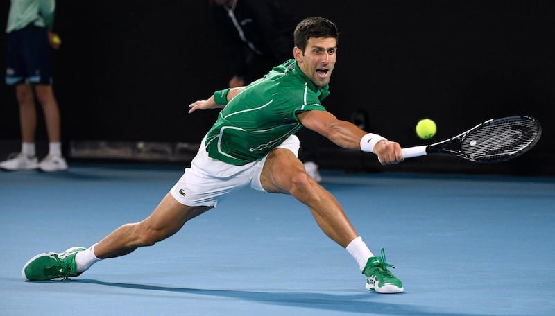 Novak Djokovic makes a backhand return. AP