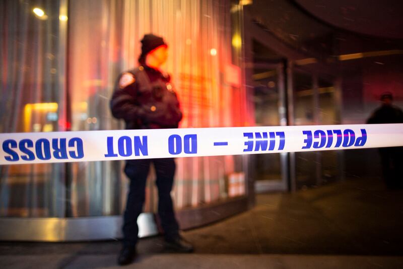 A police officer stands guard after Moma was evacuated following the stabbings.  AFP