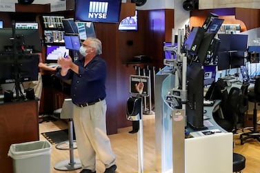 A trader on the floor of the New York Stock Exchange. The Dow Jones Index gained more than 4 per cent to close last week above 25,500 in an 11-week high. Reuters