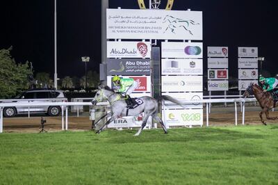 Patrick Cosgrave guides Hameem to victory in the Sheikh Zayed bin Sultan Al Nahyan National Day Cup for Purebred Arabians. Khushnum Bhandari / The National
