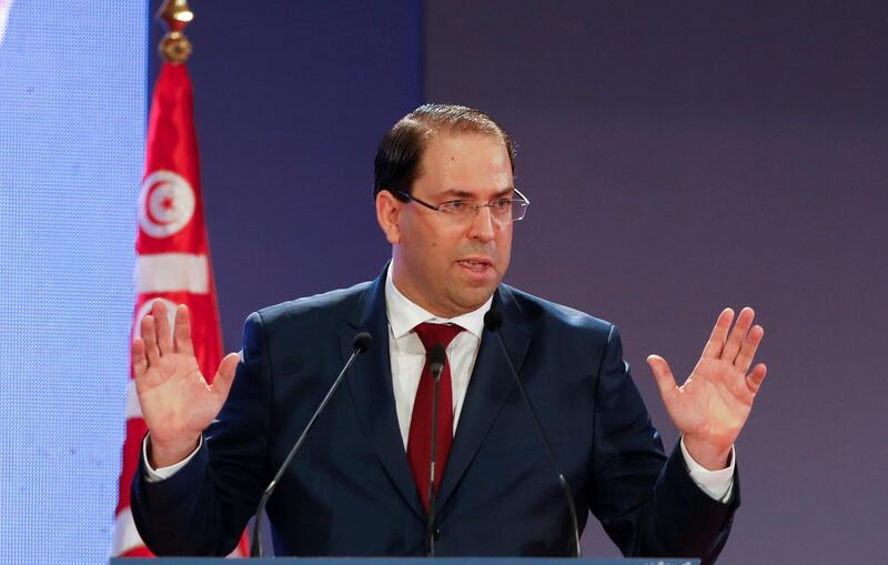 Tunisia's Prime Minister Youssef Chahed gestures as he speaks during a national conference over 2019 budget in Tunis, Tunisia, September 14, 2018. REUTERS/Zoubeir Souissi