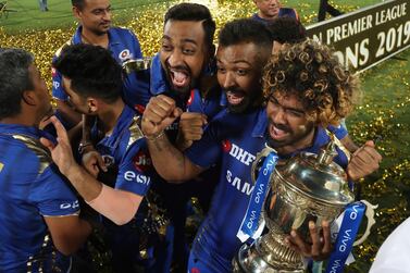 Mumbai Indians' Lasith Malinga, right, celebrates with teammates after beating Chennai Super Kings to win the 2019 Indian Premier League. AP