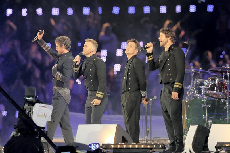 LONDON, ENGLAND - AUGUST 12:  Jason Orange, Gary Barlow, Mark Owen and Howard Donald of Take That perform during the Closing Ceremony on Day 16 of the London 2012 Olympic Games at Olympic Stadium on August 12, 2012 in London, England.  (Photo by Scott Heavey/Getty Images)