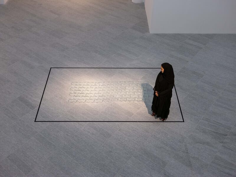 Latifa Saeed with her work 'The Pathway', on view as part of Louvre Abu Dhabi Art Here 2021. Photo: Augustine Paredes / Seeing Things