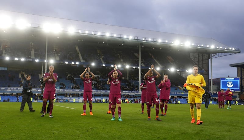 Soccer Football - Premier League - Everton vs Manchester City - Goodison Park, Liverpool, Britain - March 31, 2018   Manchester City celebrate after the match    Action Images via Reuters/Carl Recine    EDITORIAL USE ONLY. No use with unauthorized audio, video, data, fixture lists, club/league logos or "live" services. Online in-match use limited to 75 images, no video emulation. No use in betting, games or single club/league/player publications.  Please contact your account representative for further details.