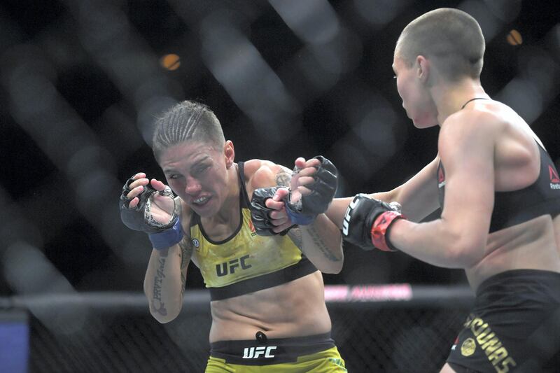 Brazilian fighter Jessica Andrade (L) competes against US fighter Rose Namajunas (R) during their women's strawweight title bout at the Ultimate Fighting Championship 237 event (UFC 237) at Jeunesse Arena in Rio de Janeiro on May 11, 2019. (Photo by Mauro Pimentel / AFP)