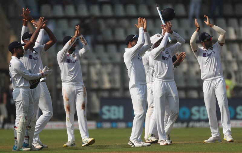 India players celebrate after beating New Zealand on Day Four of the second Test in Mumbai. AP