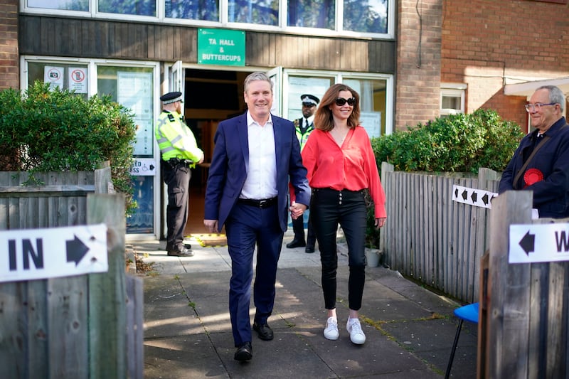 Labour leader Sir Keir Starmer and his wife Victoria after voting in London. AP Photo