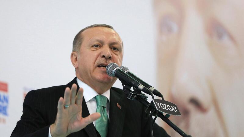 President Tayyip Erdogan said Turkish army helicopter was shot down by the YPG. AP