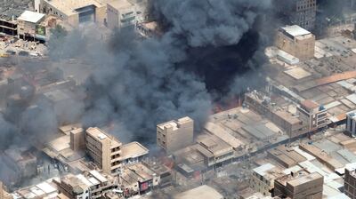 Black smoke and fire at Omdurman market in Khartoum's twin city. Reuters