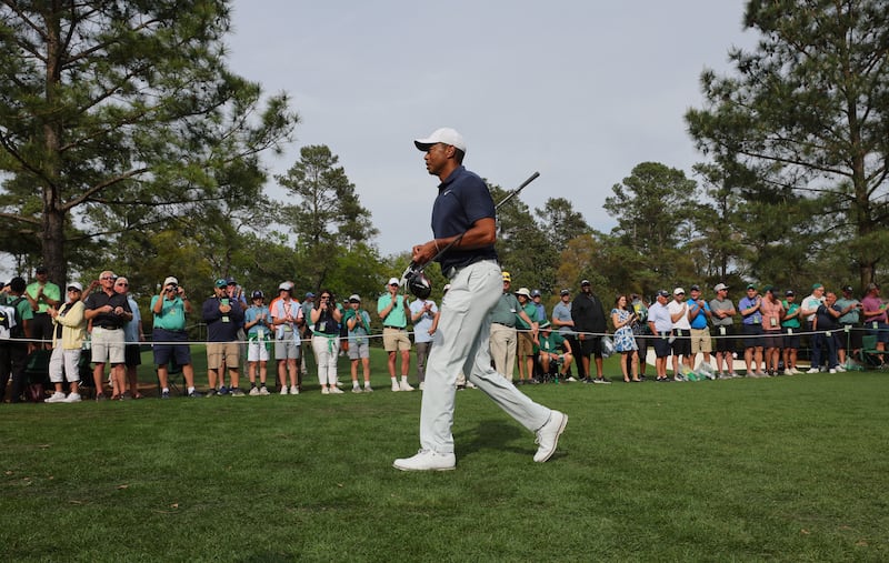 Tiger Woods walks on the eighth fairway during a practice round at Augusta National. Reuters