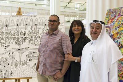 Abdullah Lutfi with his parents at Dubai International airport at the launch of DXB ART. Susanna Dahlstedt