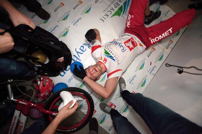 UAE - Dubai - Jan 30 - 2012: An exhausted Krystian Herba, a renowned Polish cyclist, after arriving at the 68th ﬂoor of the Rose Rayhaan hotel trying to beat the Guinness Book of World record. ( Jaime Puebla - The National Newspaper )