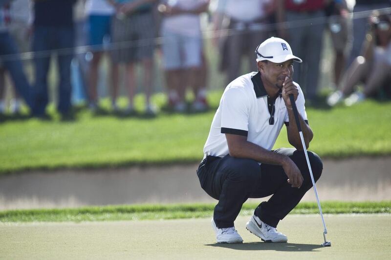 Tiger Woods was in the Champions Challenge on Tuesday and will play in his seventh Dubai Desert Classic starting Thursday. Antonie Robertson / The National

