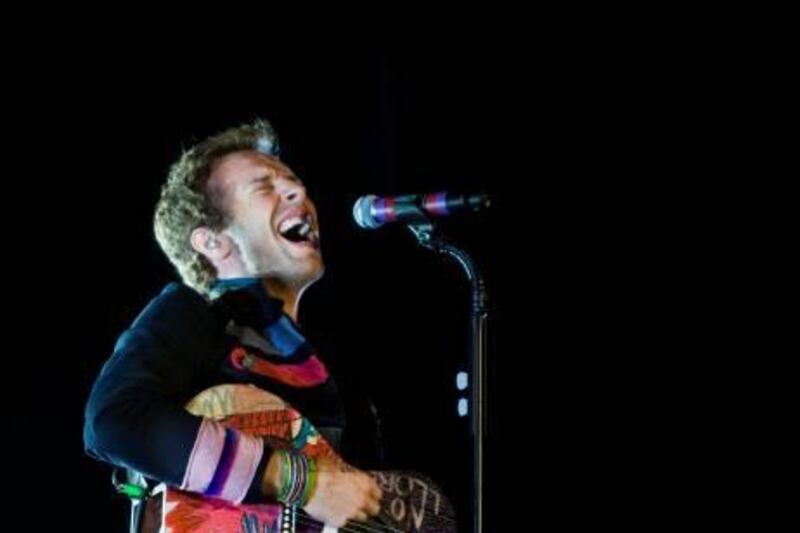 Abu Dhabi - March 28, 2009: Coldplay performs at Emirates Palace. Lauren Lancaster / The National *** Local Caption ***  na29mr-MainArt.jpg