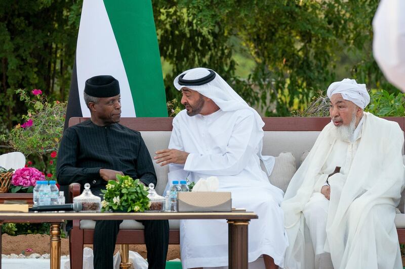 AL AIN, ABU DHABI, UNITED ARAB EMIRATES - December 09, 2019: HH Sheikh Mohamed bin Zayed Al Nahyan, Crown Prince of Abu Dhabi and Deputy Supreme Commander of the UAE Armed Forces (C) meets with HE Yemi Osinbajo, Vice President of Nigeria (L) and HE Shaykh Abdallah bin Bayyah (R), while receiving a delegation of participants of the Forum for Promoting Peace in Muslim Societies, during Al Maqam Palace barza.

( Hamad Al Mansoori for the Ministry of Presidential Affairs )​
---