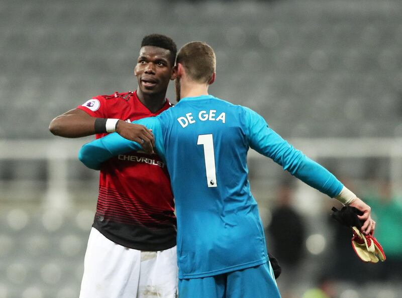 Paul Pogba celebrates with David de Gea at the end of the match. Reuters