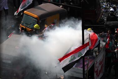 Tear-gas canisters being fired at protesters in Baghdad are 10 times heavier than those normally used in demonstrations, Amnesty International says. AP Photo