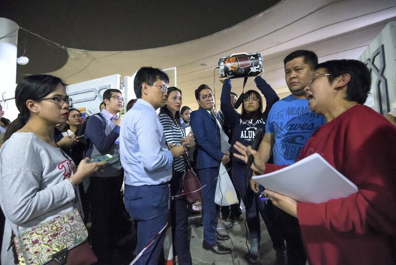 DUBAI, UNITED ARAB EMIRATES -A church volunteer giving instructions to the crowd at St. Mary's Catholic Church, Oud Mehta.  Leslie Pableo for The National for Patrick Ryan's story