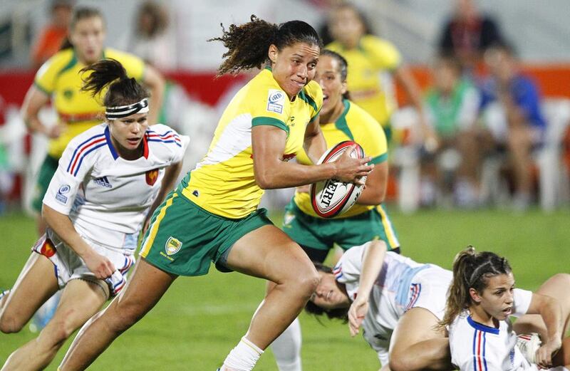 Brazil’s Mariana Ramalho powers her way through to score a try in the Women’s Sevens World Series match against France. Jake Badger for The National





