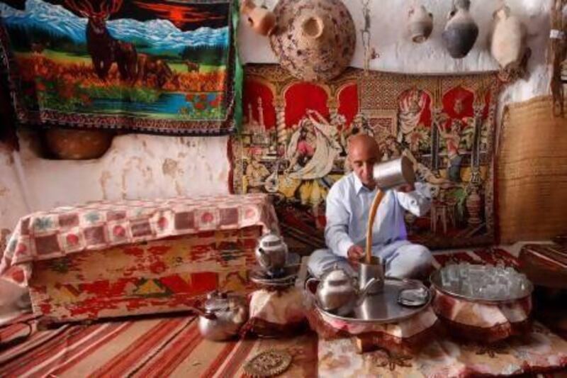 Al Arabi Belhaj prepares tea inside a cave house in the western mountain town of Gharyan, 100km south of Tripoli.