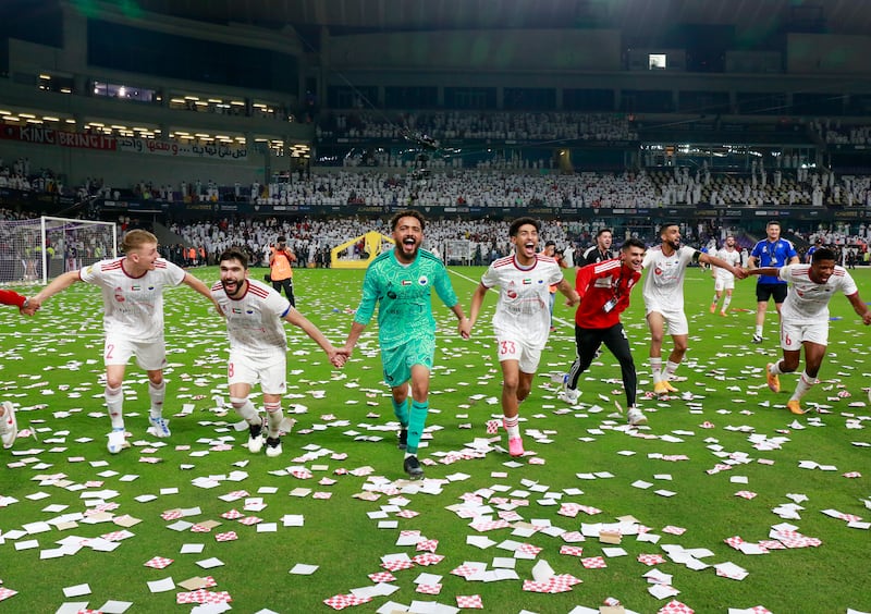 Sharjah players celebrate after defeating Al Wahda in the President’s Cup final. Victor Besa / The National