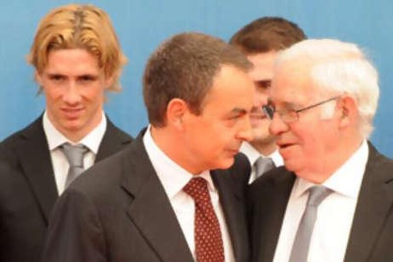 The Spanish Prime Minister Jose Luis Rodriguez Zapatero talks with Luis Aragones during a press conference at the Moncloa palace.