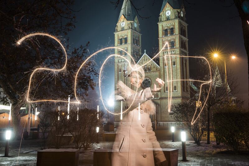 A young woman writes ‘2017’ using a sparkler during the New Year’s Eve celebrations in Nyiregyhaza, 245km east of Budapest, Hungary. EPA