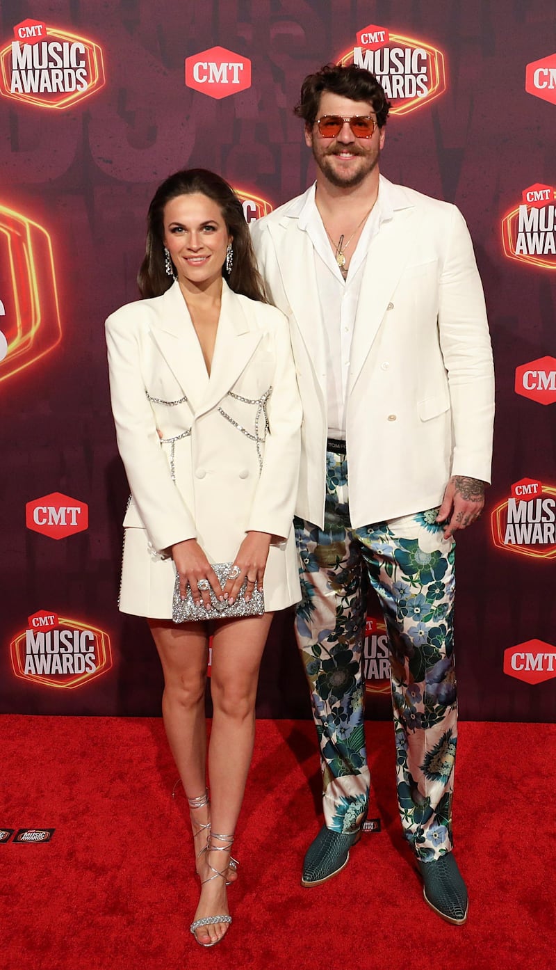 Taylor Lewan and his wife Taylin Gallacher arrive for the CMT Music Awards at Bridgestone Arena in Nashville, Tennessee, on June 9, 2021. Reuters