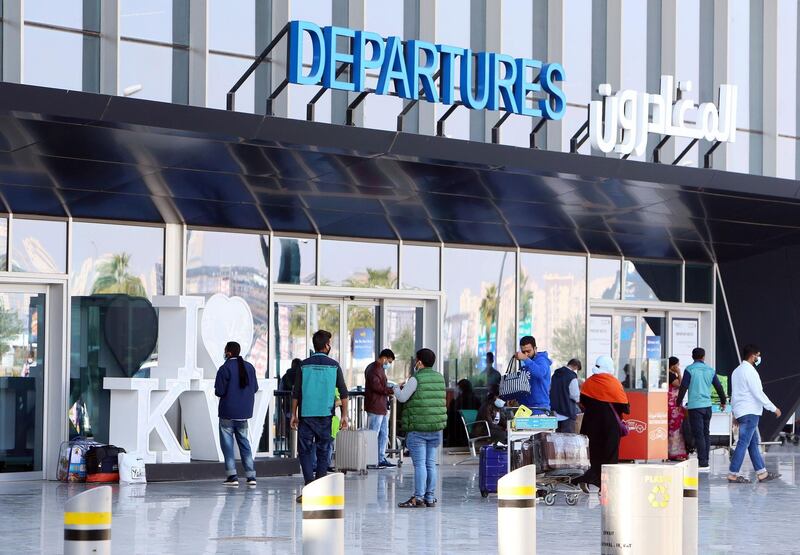 Passengers wait at the departure gate at Kuwait International Airport in Kuwait City. AFP