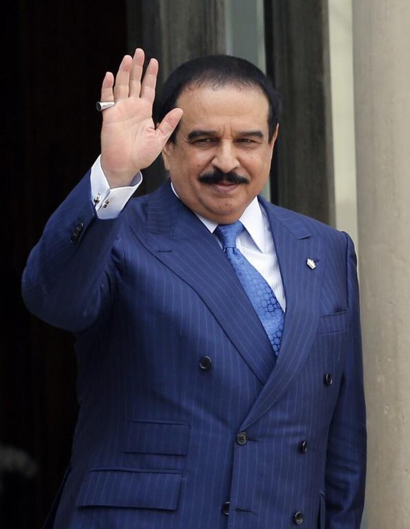 Bahrain's King Hamad, pictured here on September 8, 2015, has approved a law passed by parliament allowing for military courts to try civilians. Christophe Ena, File / AP Photo