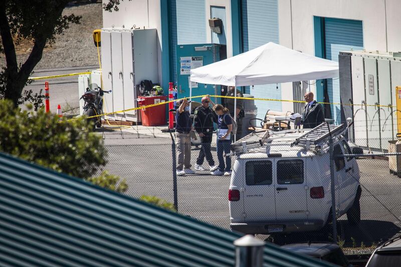 Investigators at the scene of the shooting. San Jose Mayor Sam Liccardo said the city was "in a very dark moment". AFP