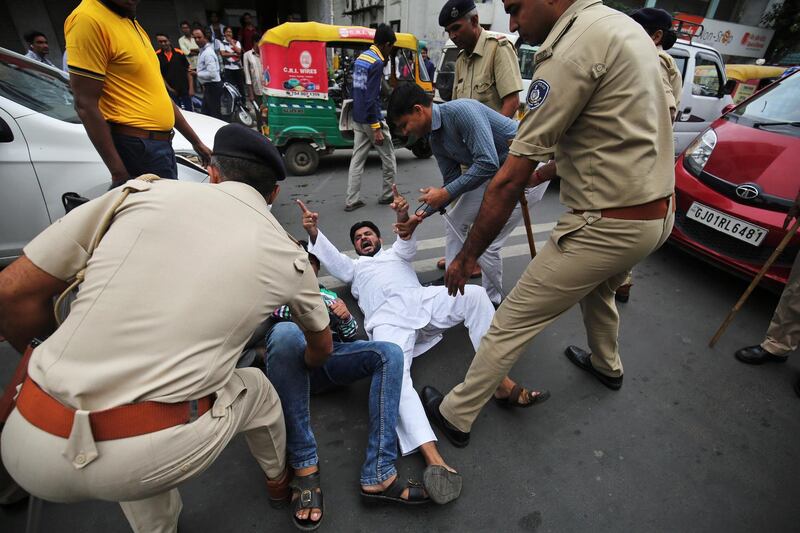 Police detain supporters of India's main opposition Congress party, during a nationwide strike against hike in fuel prices, in Ahmedabad, India. Amit Dave / Reuters