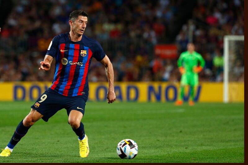 Robert Lewandowski making his debut for Barcelona against Rayo Vallecano. AP