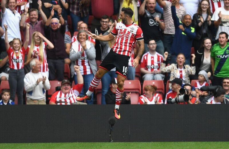 Charlie Austin of Southampton celebrates scoring his side’s first and winning goal against Swansea City in the Premier League on Sunday. Michael Regan / Getty Images