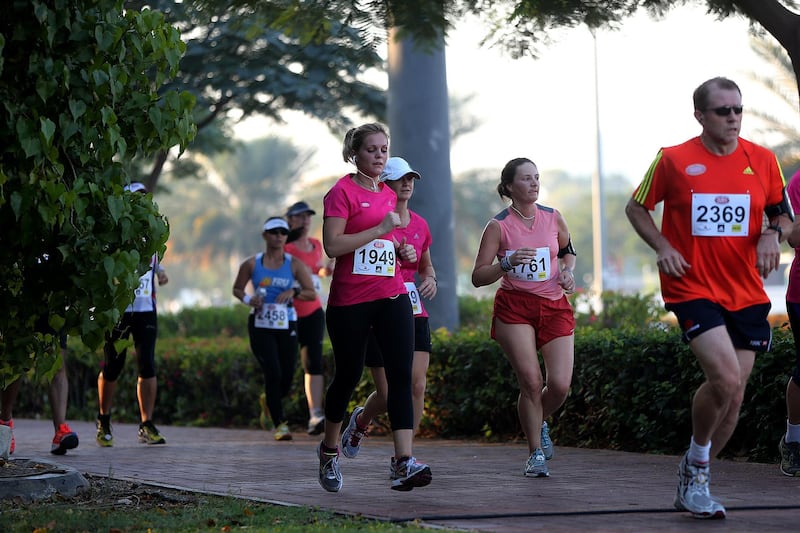 Dubai, United Arab Emirates- December,06, 2013 : Residents in UAE participate in the Half Marathon in Dubai. ( Satish Kumar / The National ) For News / Story by Nadeem *** Local Caption ***  SK-Marathon-06122013-05.jpg