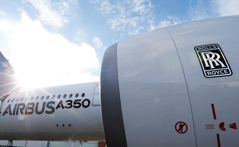 FILE PHOTO: An Airbus A350 is pictured with a Rolls-Royce logo at the Airbus headquarters in Toulouse, France December 4, 2014.  REUTERS/ Regis Duvignau/File Photo
