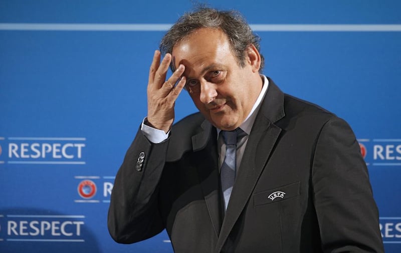 Michel Platini, the Uefa president, has criticised a newspaper report which alleged he had colluded with Qatari Mohammed bin Hammam before the bid to secure the 2022 World Cup. Lionel Cironneau / AP Photo