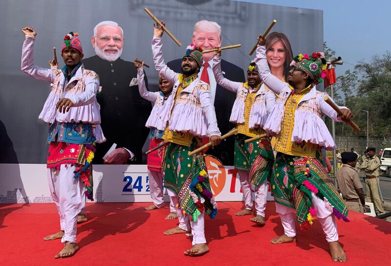 Participants perform Dandiya, a traditional dance, to welcome U.S. President Donald Trump and first lady Melania Trump in Ahmedabad. REUTERS