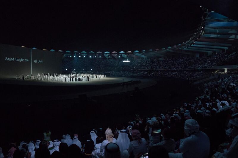 ABU DHABI, UNITED ARAB EMIRATES - December 02, 2018: Performers participate in a show titled 'This is Zayed, This is UAE', during the 47th UAE National Day celebrations, at Zayed Sports City.

( Hamad Al Mansouri for the Ministry of Presidential Affairs  )
---