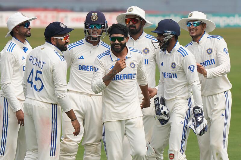India bowler Ravindra Jadeja celebrates the wicket of England's Jonny Bairstow. AP
