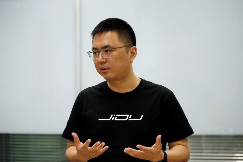 Xia Yiping, chief executive officer of Jidu Auto, an electric vehicle (EV) joint venture by Baidu and Geely, attends an interview with Reuters in Beijing, China April 23, 2021. REUTERS/Florence Lo