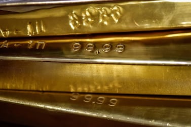 Gold bars in Kazakhstan National Bank's vault in Almaty. Spot gold prices fell  0.1% to $1,699.33 per oz on Tuesday as confidence about the prospects for the global economy picked up. Reuters