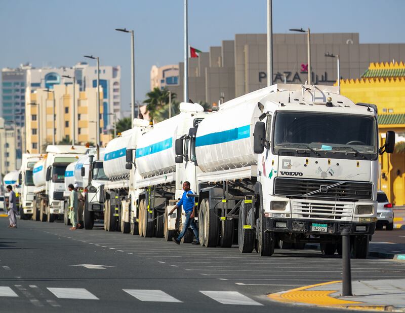 A fleet of water drainage lorries near Al Nahyan Camp, in Abu Dhabi. The country is braced for heavy rain at the weekend. Victor Besa / The National