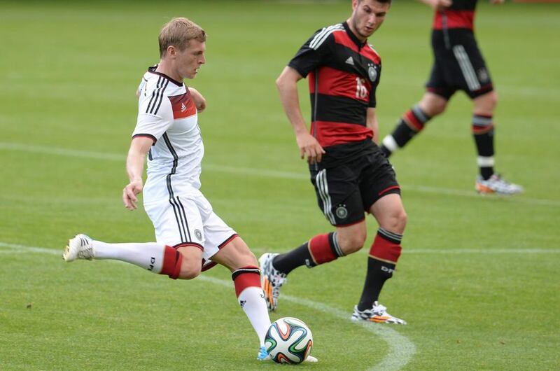 Germany's Toni Kroos, left, in action during Sunday's match against the German U-20 side. Andreas Gebert / EPA